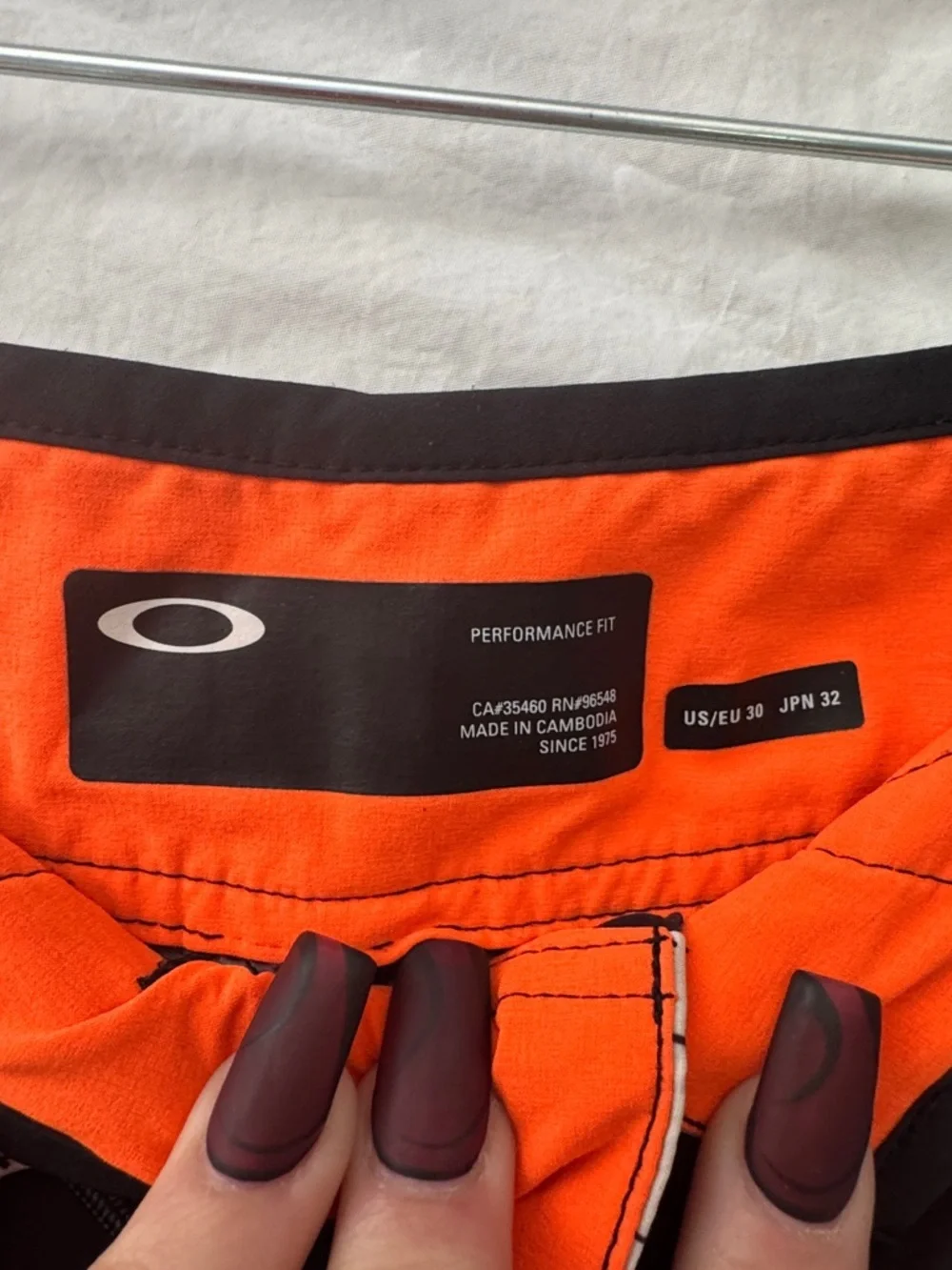 Oakley Black Swim Board Shorts with White and Orange Waistband